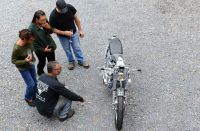 WITH-PEOPLE-AROUND-THE-BIKE-2-e1506288372452